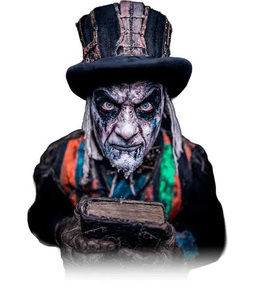 Book-Holding Ghoul – San Jose Haunted House Creature Rotten ghoul holding book with intense gaze at haunted attraction